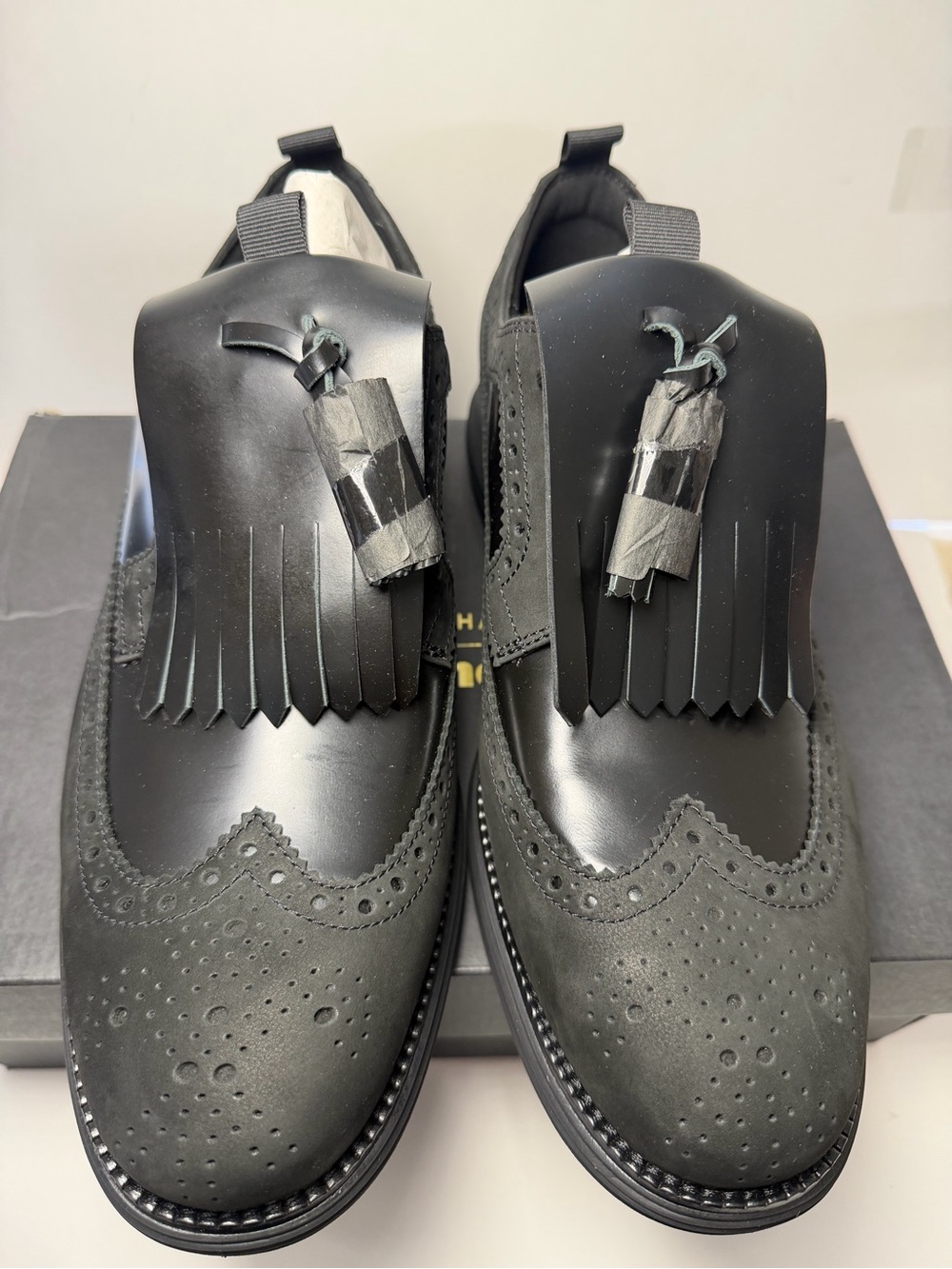 Cole Haan Black Wingtip Kiltie Tassel Loafers